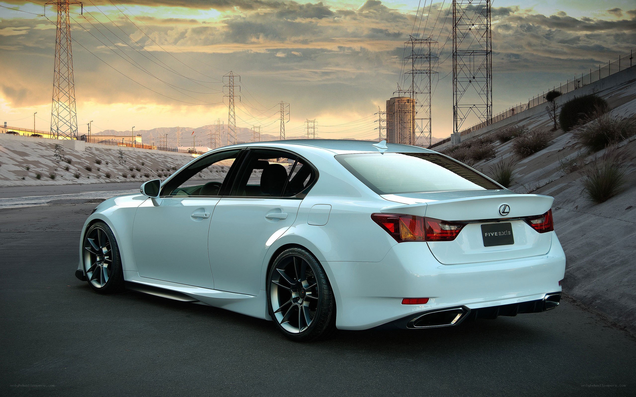 White Lexus GS in industrial setting