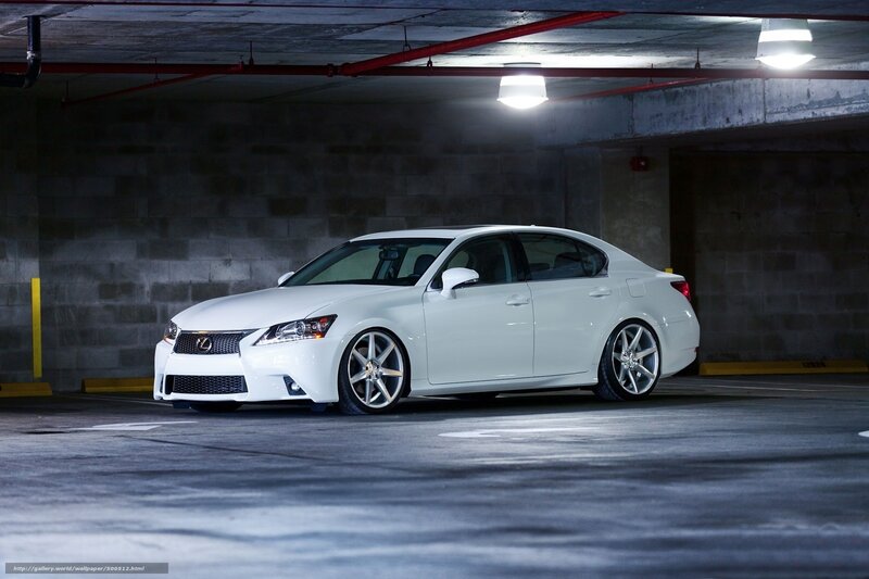 White Lexus GS in parking garage