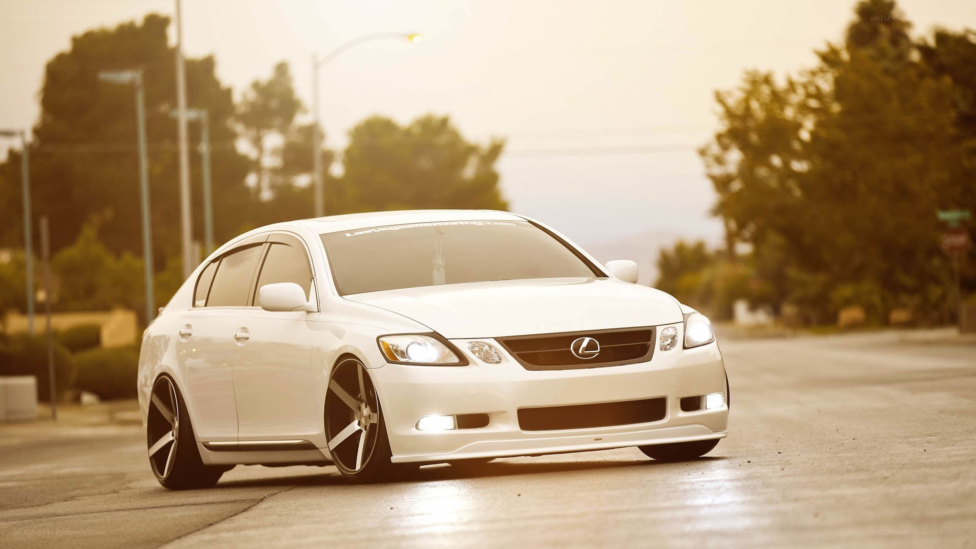 white lexus gs on street