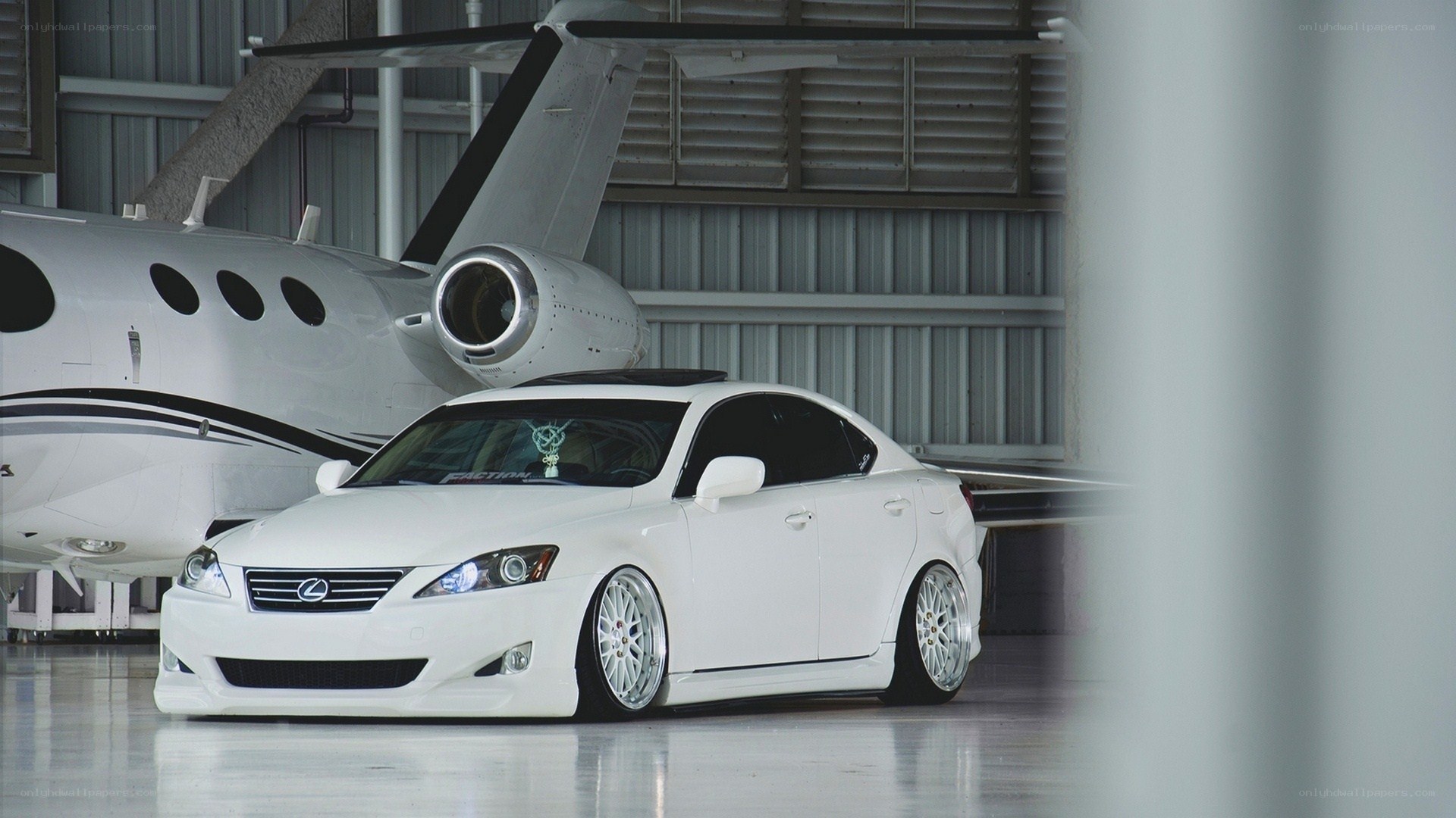White Lexus in hangar