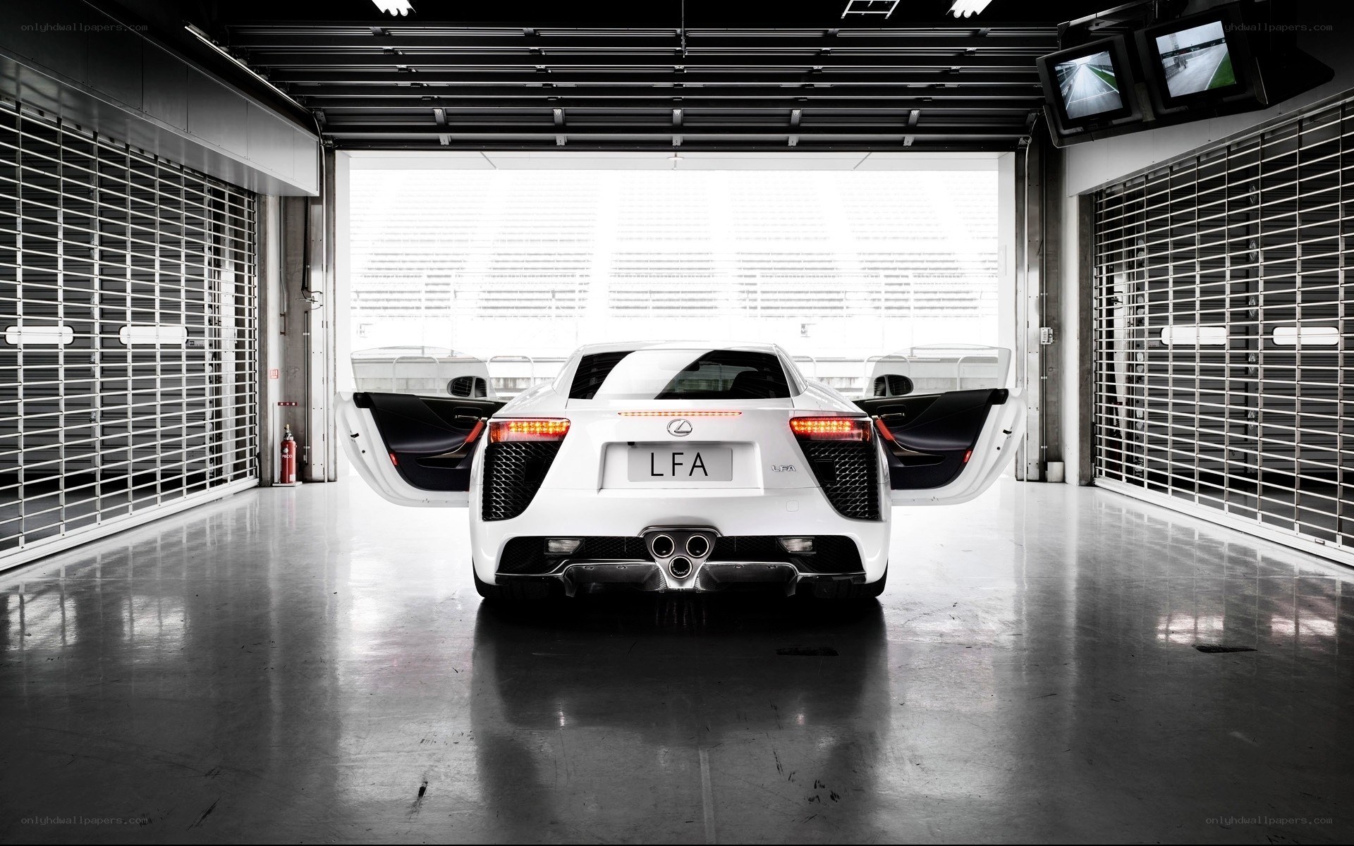 White Lexus LFA in garage