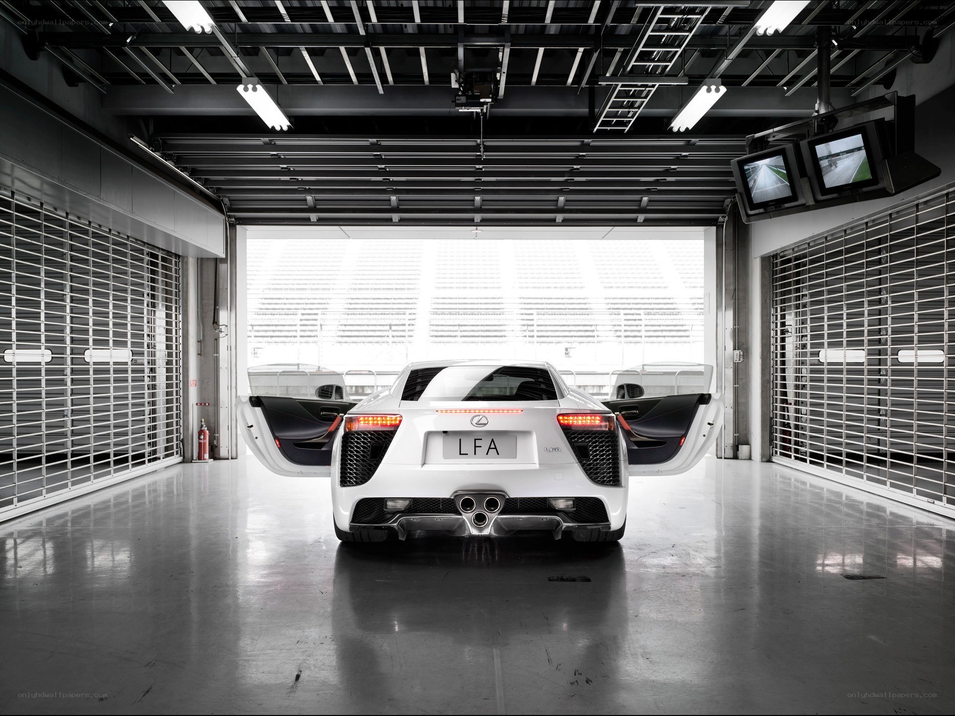 White Lexus LFA in garage