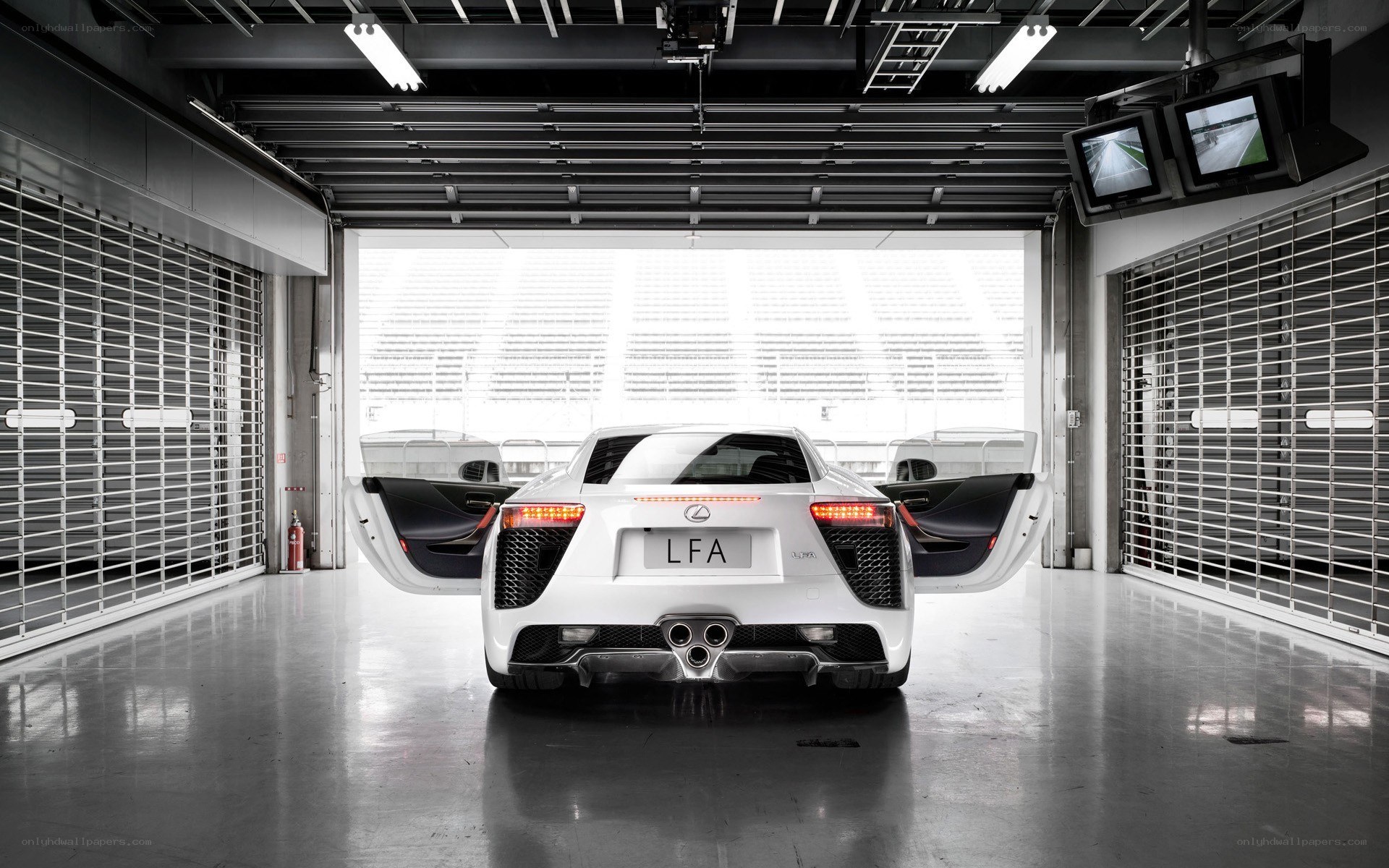 White Lexus LFA in garage