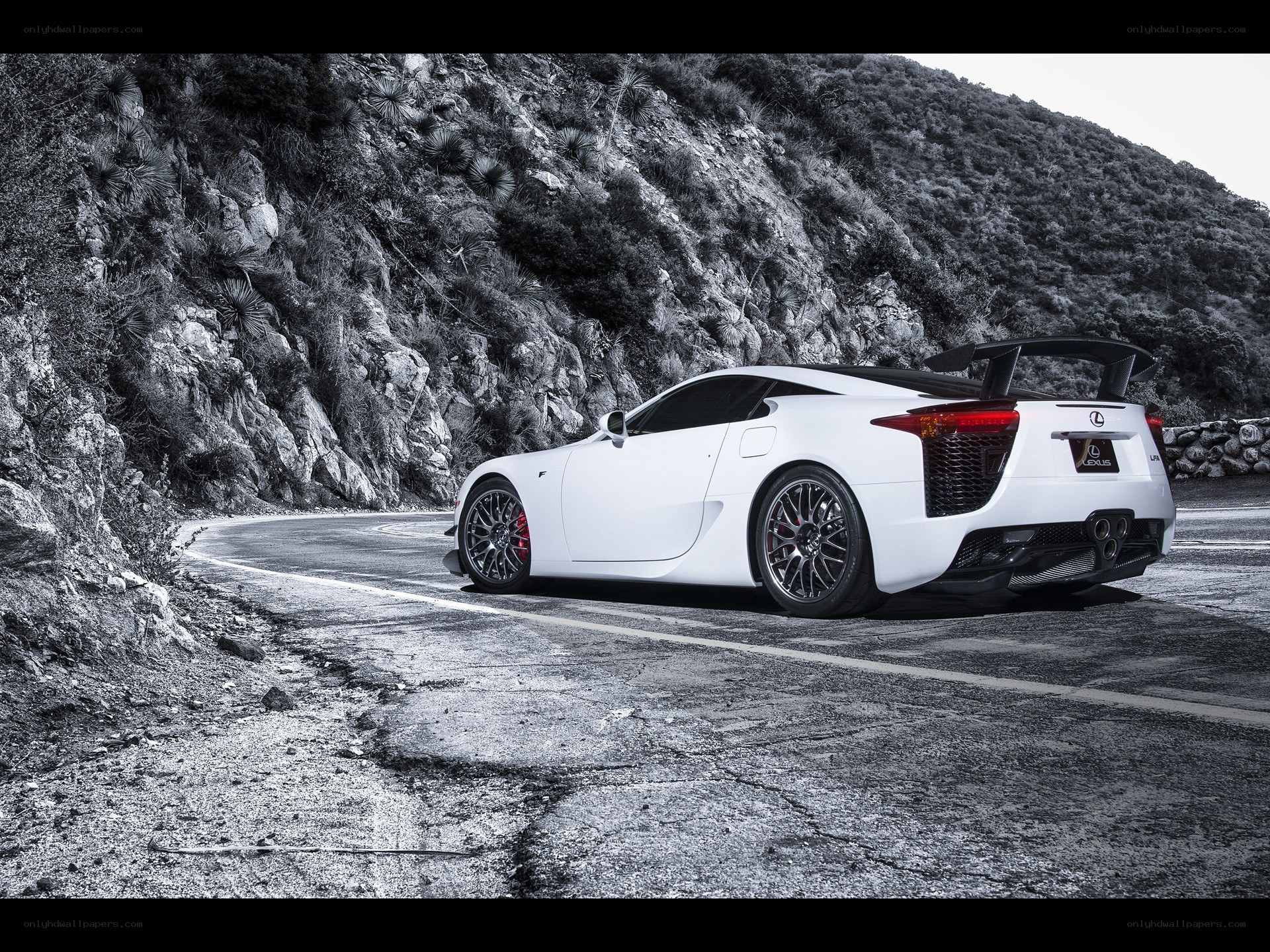 White Lexus LFA on winding road