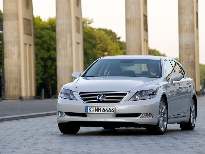 White Lexus LS sedan on street