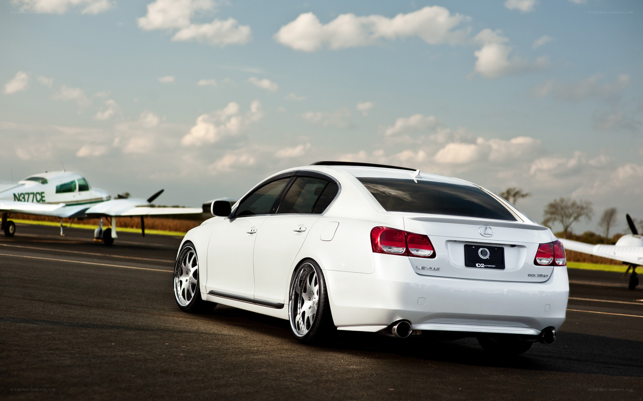White Lexus on airfield