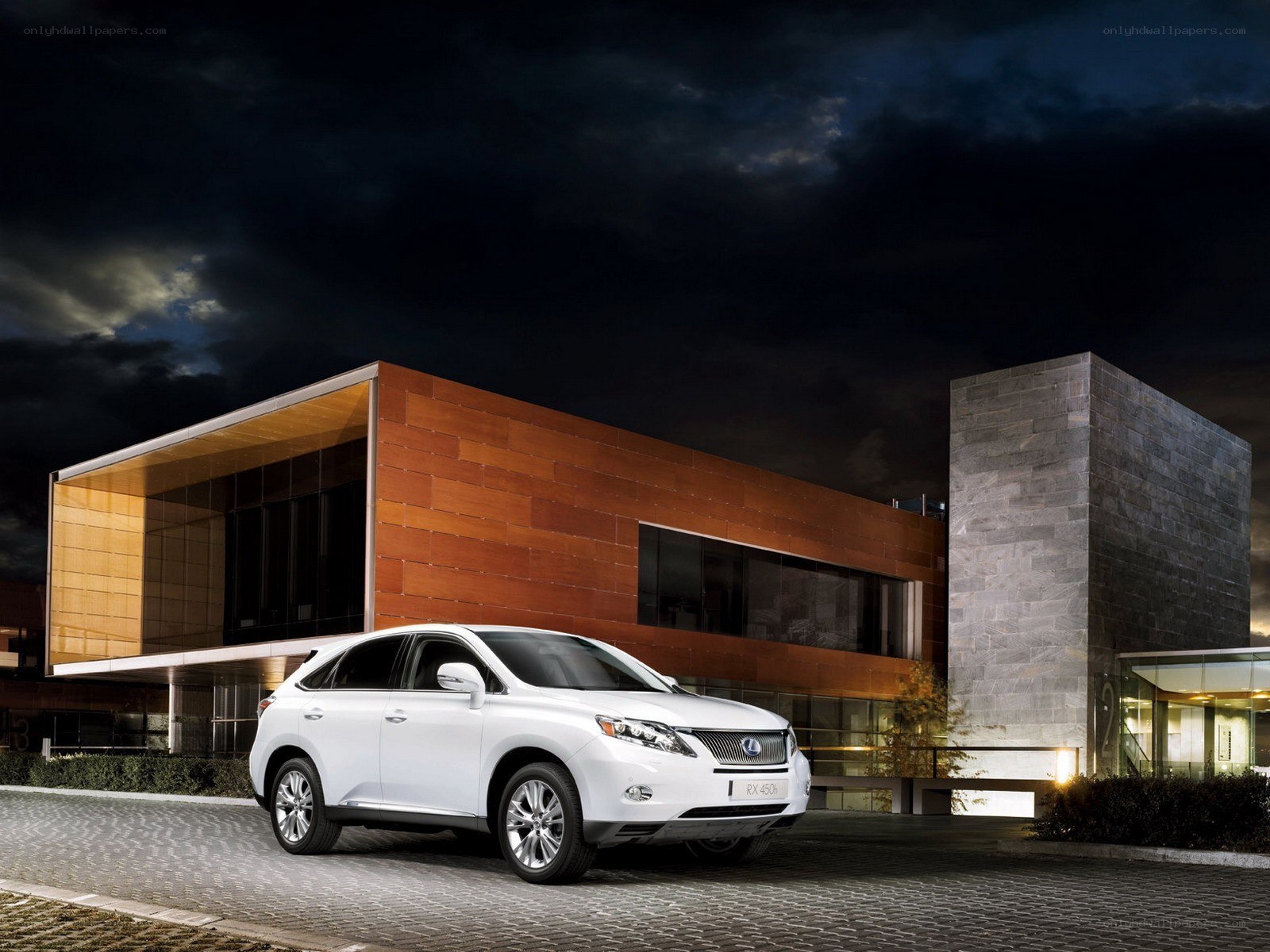 White Lexus RX450h at night