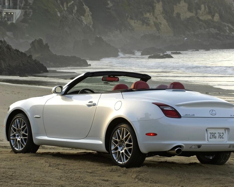 White Lexus SC convertible on beach