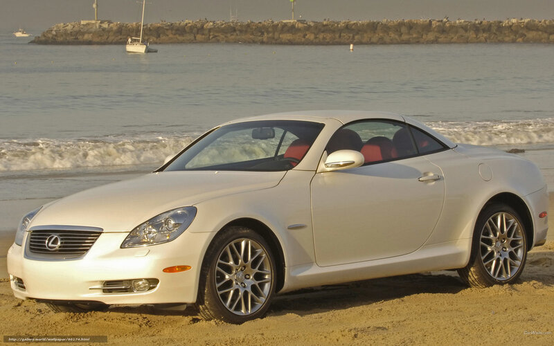 White Lexus SC on the beach