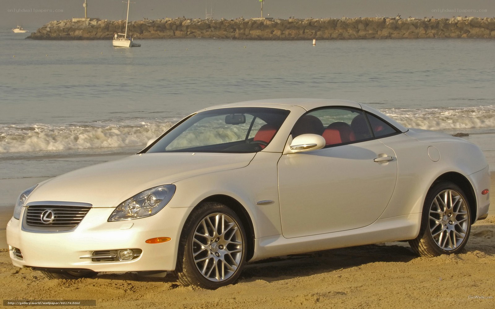 White Lexus SC on the beach