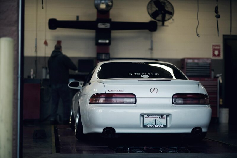 White Lexus SC400 in a garage