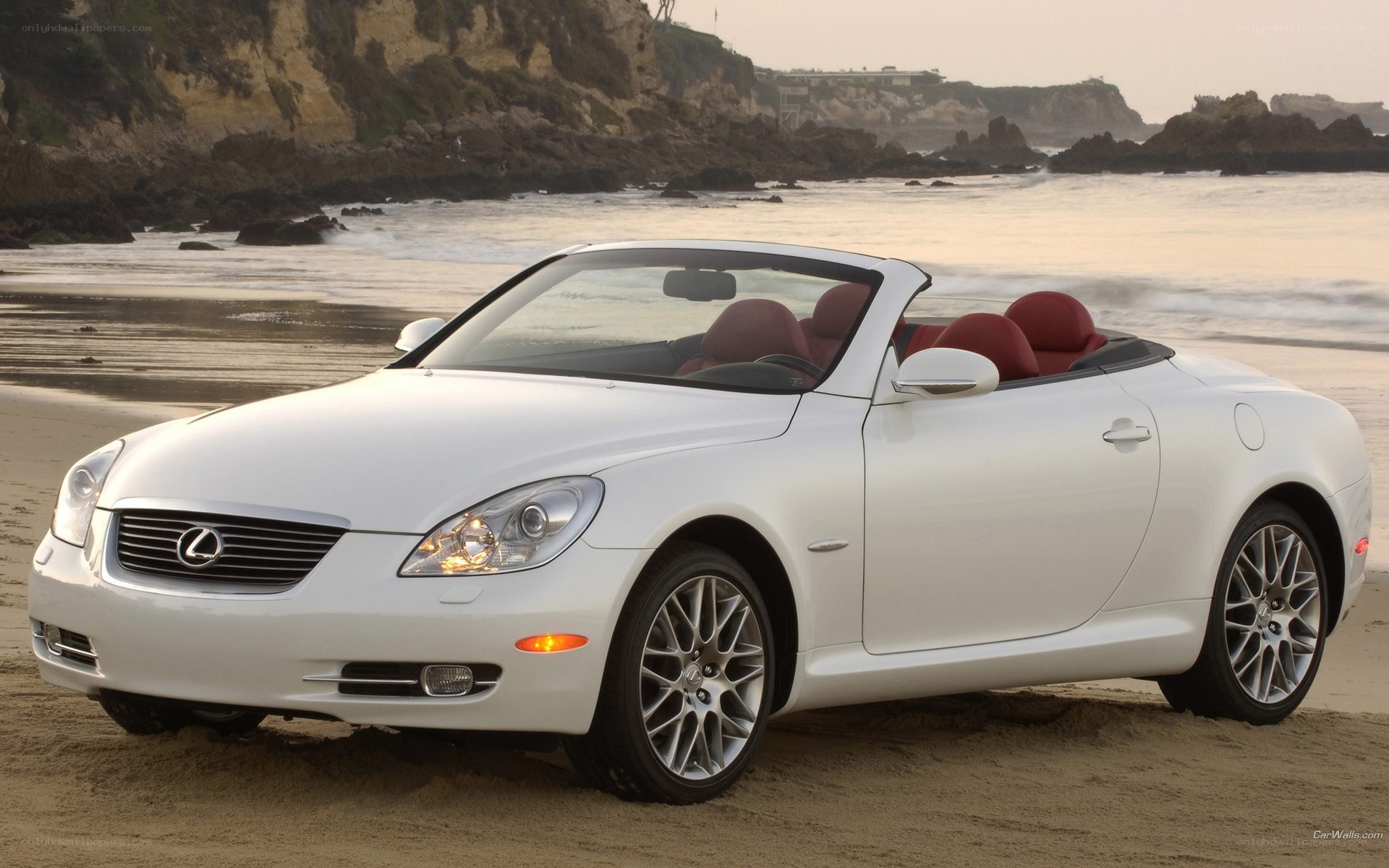 White Lexus SC430 on beach