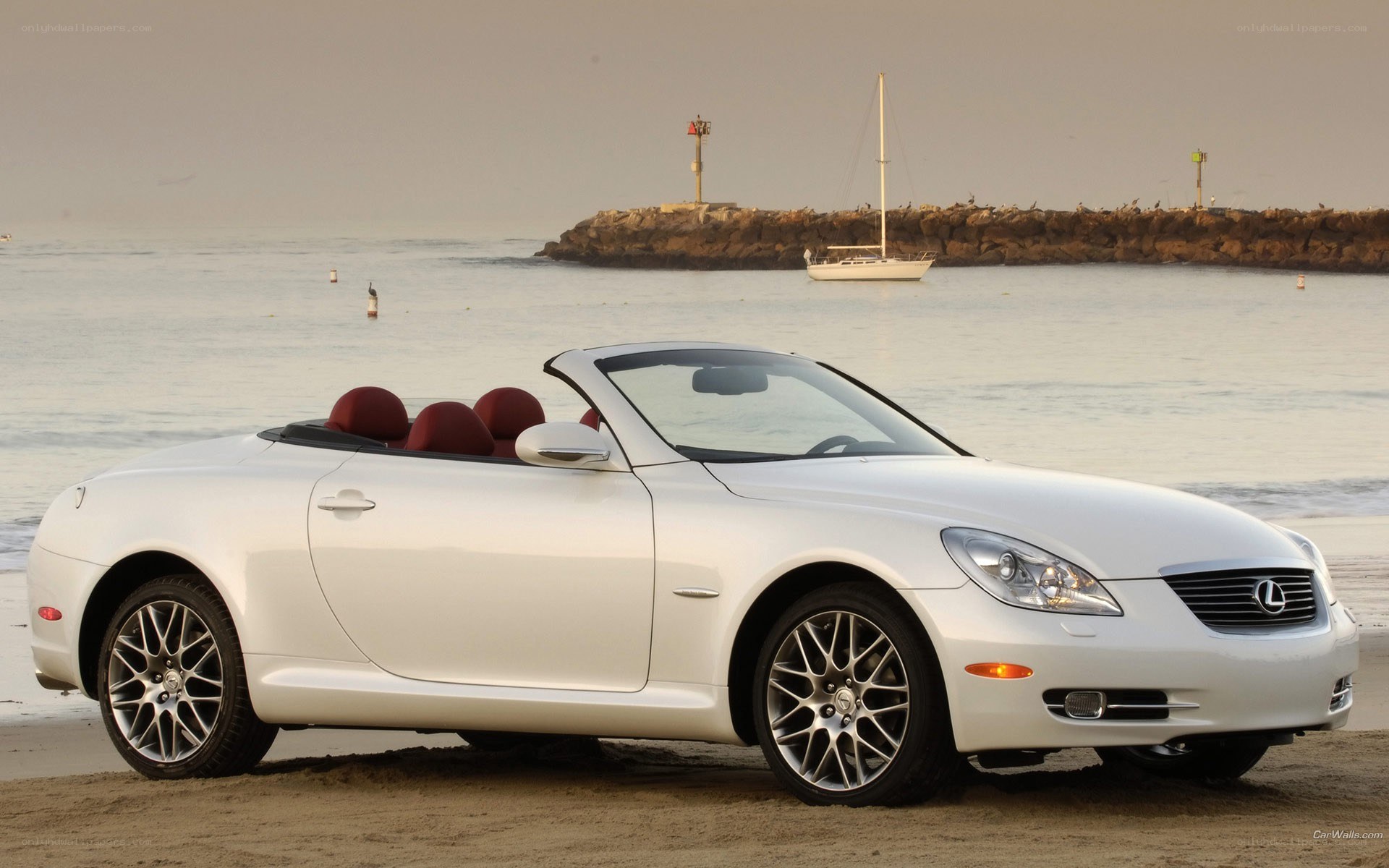White Lexus SC430 on beach