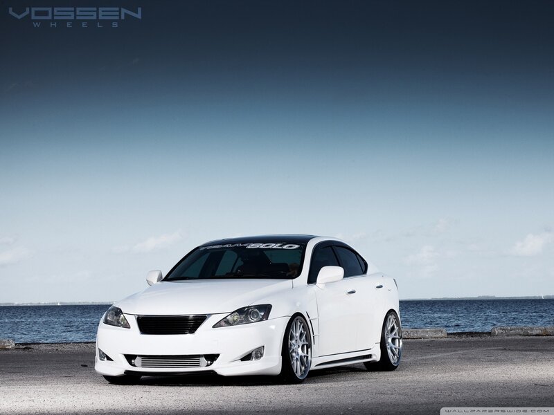 white lexus sedan by the water