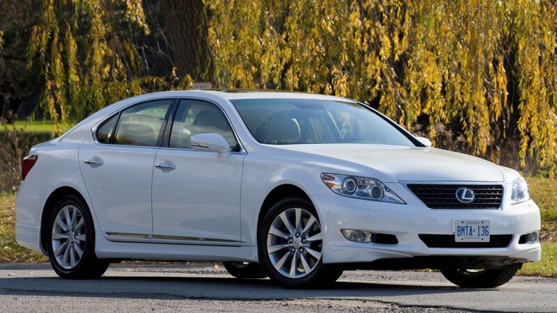 white lexus sedan in autumn