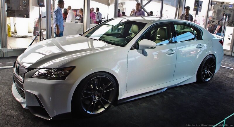 white lexus sedan on display