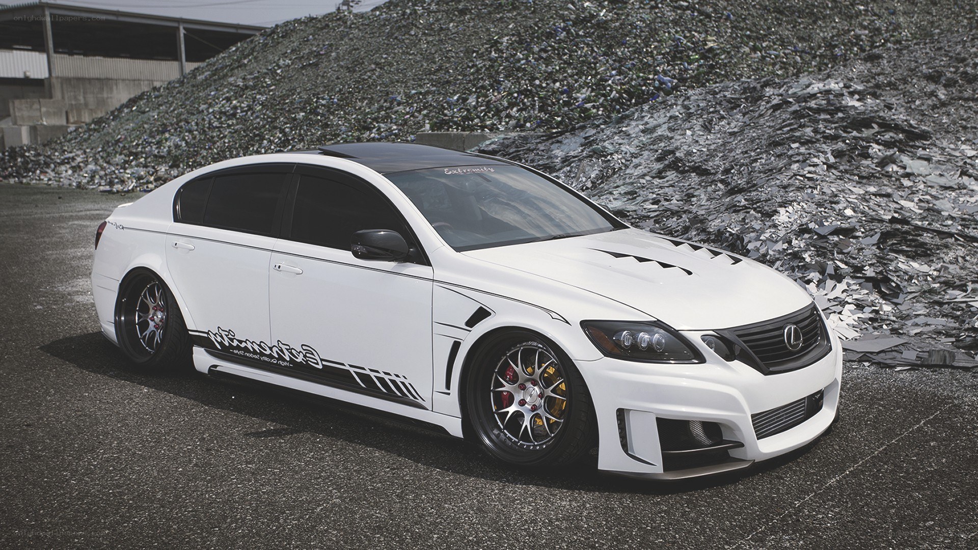 white lexus sedan with custom body kit