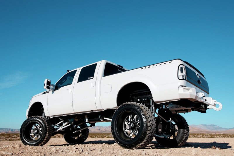 White Lifted Pickup Truck — Dramatic, Afternoon, Photograph, Desert