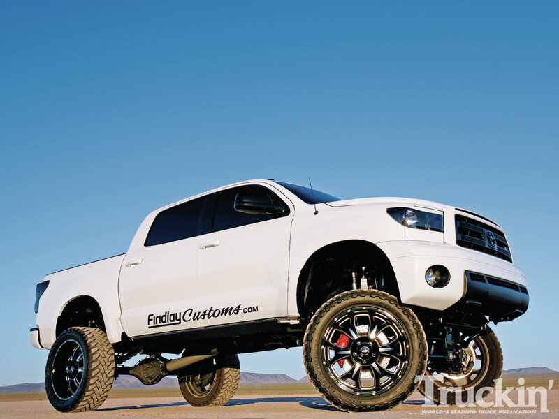White Lifted Pickup Truck — Dramatic