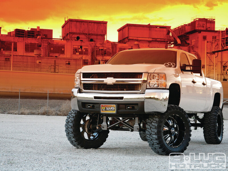 White Lifted Pickup Truck — Orange