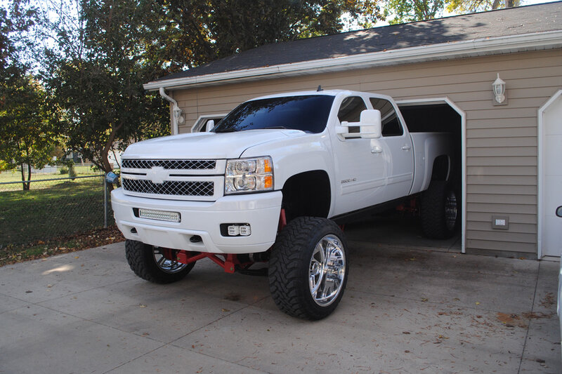 White Lifted Truck — Calm