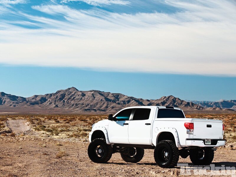 White Lifted Truck — Serene