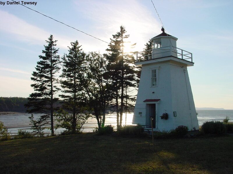 White lighthouse by the sea