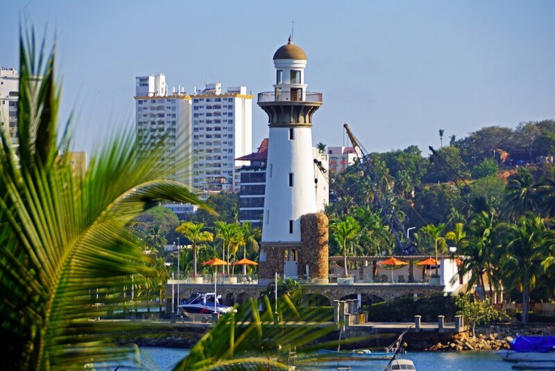 White Lighthouse by Water — Blue, Serene