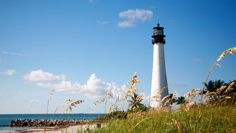 White Lighthouse on Beach — Blue