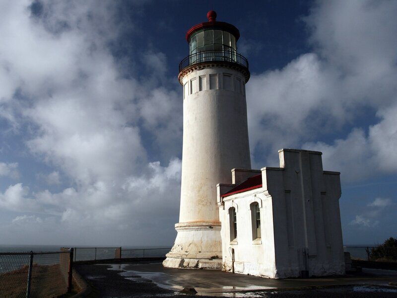 White Lighthouse on Coast — Dramatic