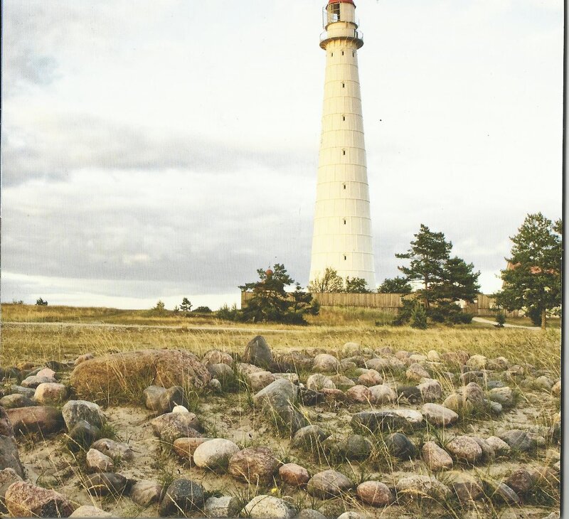 White Lighthouse on Coast — Serene