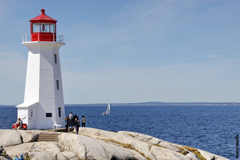 White Lighthouse on Rocks