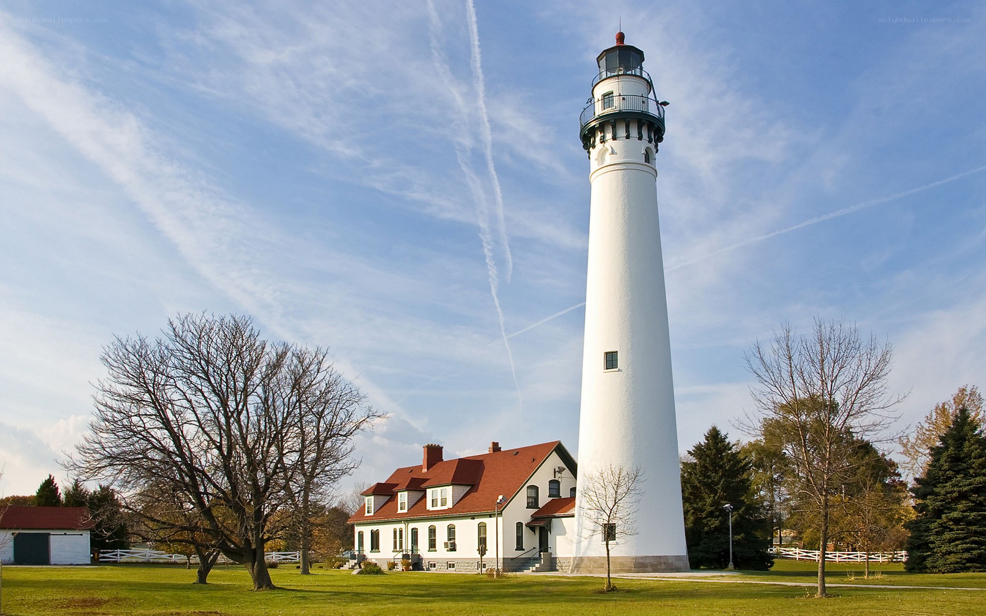 White lighthouse with keeper's house