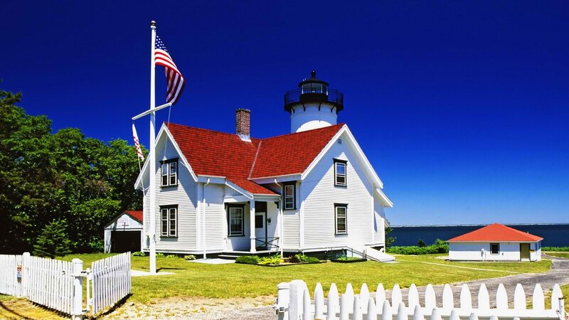 White lighthouse with red roof