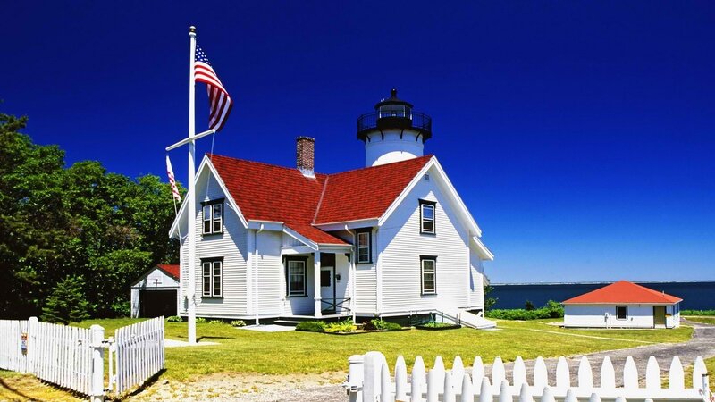 White lighthouse with red roof