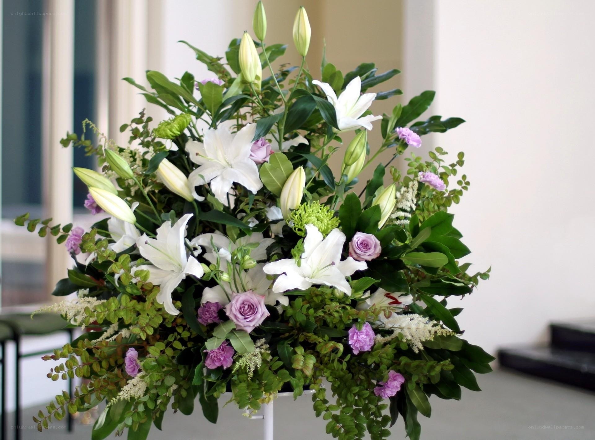 white lilies and purple roses