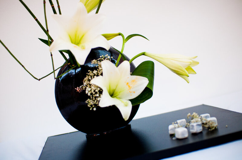 White Lilies in Black Vase
