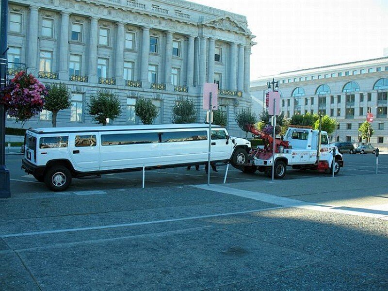 White limo being towed