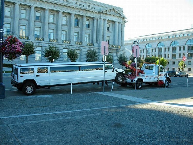 White limo being towed