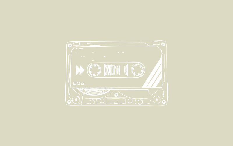 white line drawing of a cassette tape
