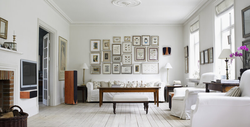 White living room with gallery wall