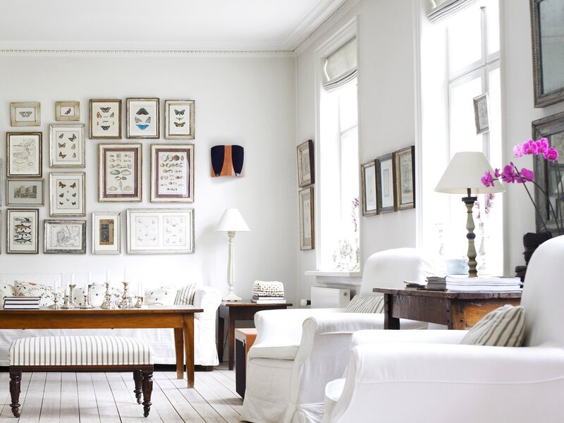 White living room with gallery wall