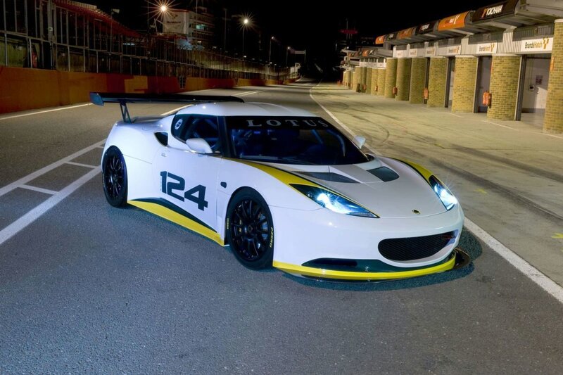 White Lotus race car at night