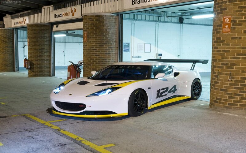White Lotus race car in garage