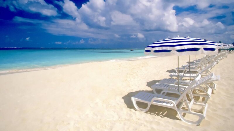 White Lounge Chairs on Beach — Blue, Serene