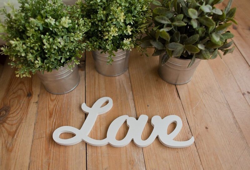 White Love Sign on Wood