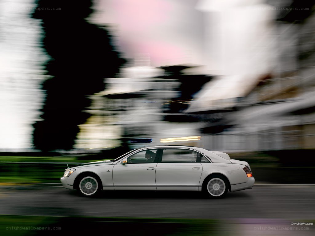 White luxury car in motion