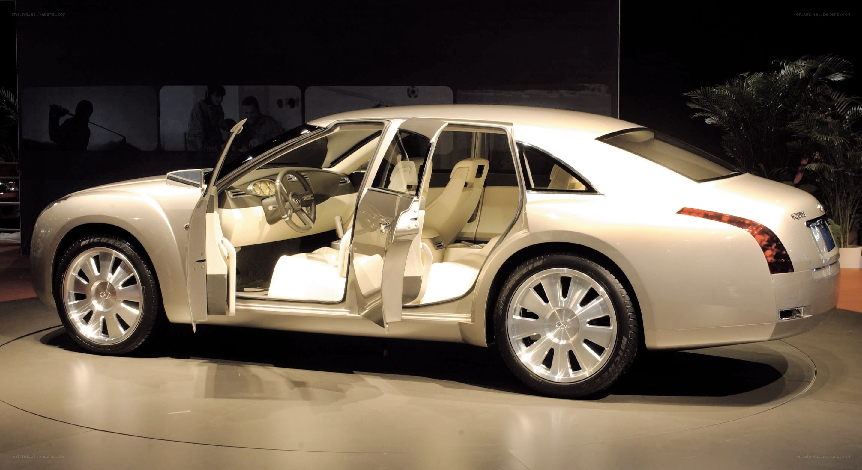 white luxury car on display
