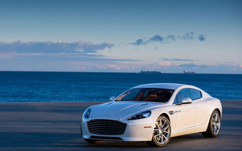 White Luxury Car — Serene, Sunset