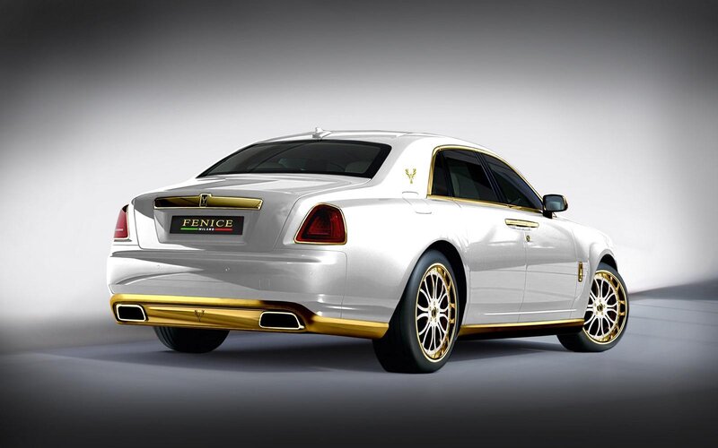 White luxury car with gold accents